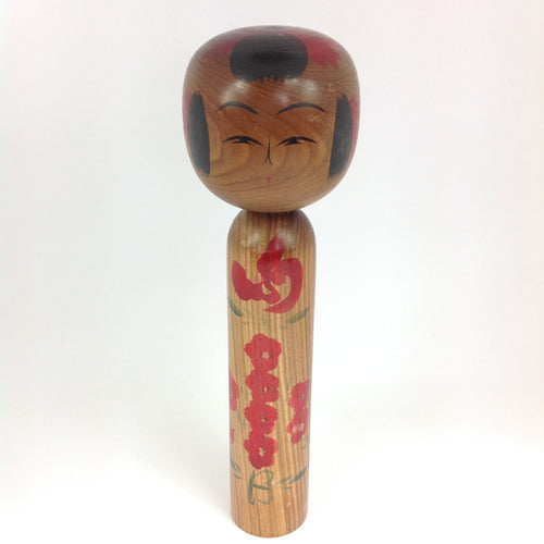 Vintage Kokeshi med Traditionelt Mønster i Rød og Grøn